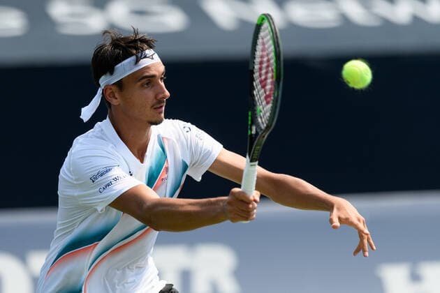 TORONTO, ON - AUGUST 09: Lorenzo Sonego (ITA) returns the ball during his National Bank Open tennis tournament first round game on August 9, 2021, at Aviva Centre in Toronto, ON, Canada. (Photo by Julian Avram Icon Sportswire) TENNIS: AUG 09 National Bank Open Icon2108090450