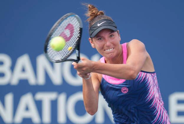 August 9, 2021, Montreal, PQ, Canada: Oceane Dodin of France returns o Karolina Muchova of the Czech Republic during first round of play at the National Bank Open tennis tournament Monday August 9, 2021 in Montreal. Oceane Dodin  - ZUMAc35_ 20210809_zaf_c35_085 Copyright: xPaulxChiassonx