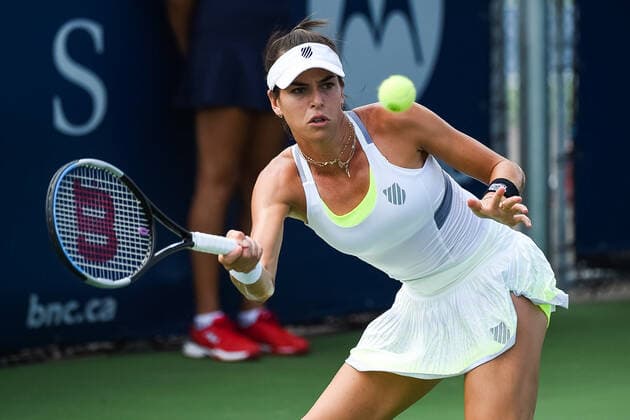August 09, 2021: Ajla Tomljanovic (AUS) returns the ball during the WTA, Tennis Damen National Bank Open first round match at IGA Stadium in Montreal, Quebec. CSM Montreal Canada - ZUMAc04_ 20210809_zaf_c04_057 Copyright: xDavidxKirouacx