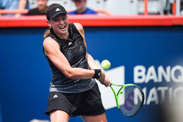 August 09, 2021: Jelena Ostapenko (LAT) returns the ball during the WTA, Tennis Damen National Bank Open first round match at IGA Stadium in Montreal, Quebec. CSM Montreal Canada - ZUMAc04_ 20210809_zaf_c04_074 Copyright: xDavidxKirouacx