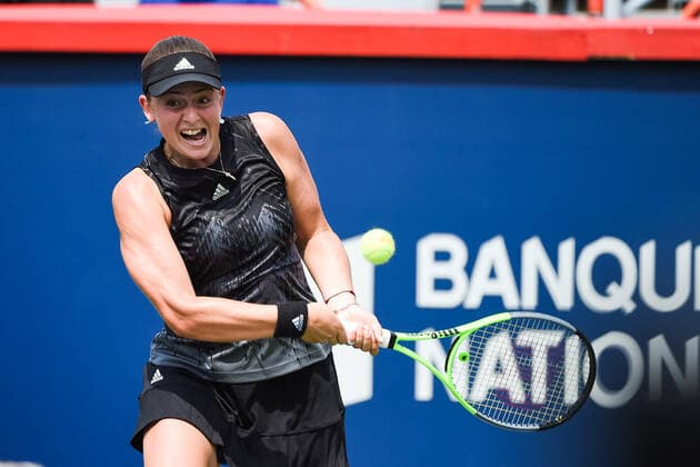August 09, 2021: Jelena Ostapenko (LAT) returns the ball during the WTA, Tennis Damen National Bank Open first round match at IGA Stadium in Montreal, Quebec. CSM Montreal Canada - ZUMAc04_ 20210809_zaf_c04_075 Copyright: xDavidxKirouacx