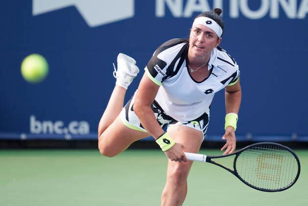 August 9, 2021, Montreal, PQ, Canada: Ons Jabeur of Tunisia serves to Clara Burel of France during first round of play at the National Bank Open tennis tournament Monday August 9, 2021 in Montreal. Ons Jabeur  - ZUMAc35_ 20210809_zaf_c35_112 Copyright: xPaulxChiassonx
