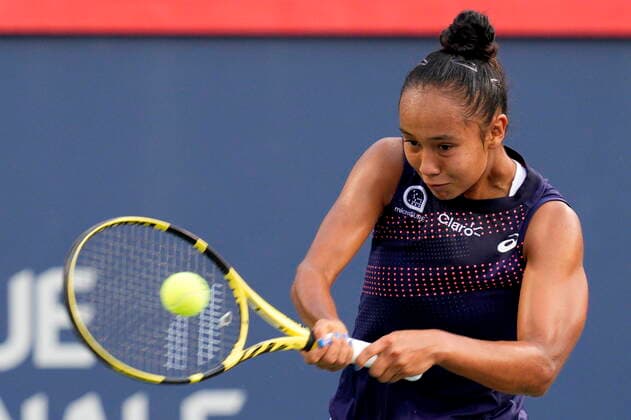 August 9, 2021, Montreal, PQ, Canada: Leylah Fernandez, of Canada, returns to Harriet Dart, of the United Kingdom, during National Bank Open tennis action in Montreal, Monday, Aug. 9, 2021. Canada News - August 9, 2021 - ZUMAc35_ 20210809_zaf_c35_139 Copyright: xPaulxChiassonx