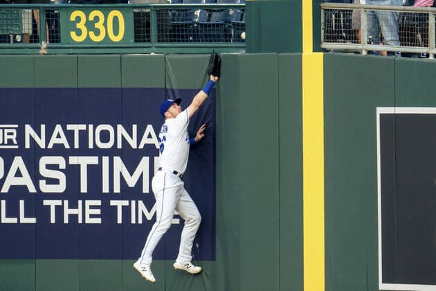 Kansas City Royals first baseman Ryan O Hearn (66) misses a catch as the ball ricochets off the wall for a New York Yankees triple play in the second inning at Kaufman Stadium in Kansas City, Missouri on Monday, August 09, 2021.  KCP20210809111 KYLExRIVAS