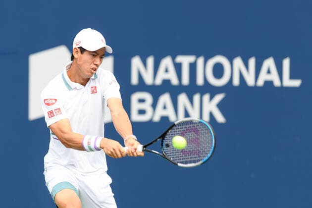 TORONTO, ON - AUGUST 10: Kei Nishikori (JPN) returns the ball during his National Bank Open tennis tournament first round game on August 10, 2021, at Aviva Centre in Toronto, ON, Canada. (Photo by Julian Avram Icon Sportswire) TENNIS: AUG 10 National Bank Open Icon2108100023