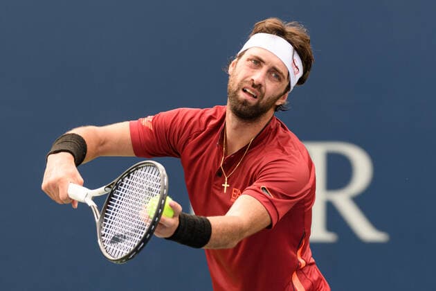 TORONTO, ON - AUGUST 10: Nikoloz Basilashvili (GEO) serves the ball during his National Bank Open tennis tournament first round game on August 10, 2021, at Aviva Centre in Toronto, ON, Canada. (Photo by Julian Avram Icon Sportswire) TENNIS: AUG 10 National Bank Open Icon2108100292