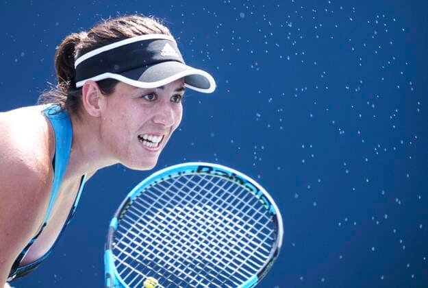 August 10, 2021, Montreal, PQ, Canada: Sweat sprays off the face of Garbine Muguruza of Spain as she serves to Katerina Siniakova of the Czech Republic during second round of play at the National Bank Open tennis tournament Tuesday August 10, 2021 in Montreal. Garbine Muguruza  - ZUMAc35_ 20210810_zaf_c35_050 Copyright: xPaulxChiassonx
