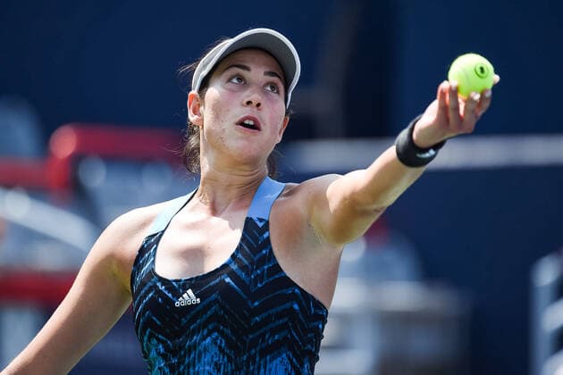 MONTREAL, QC - AUGUST 10: Grabine Muguruza (ESP) serves the ball during the second round WTA, Tennis Damen National Bank Open match on August 10, 2021 at IGA Stadium in Montreal, QC (Photo by David Kirouac Icon Sportswire) TENNIS: AUG 10 National Bank Open Icon210810047