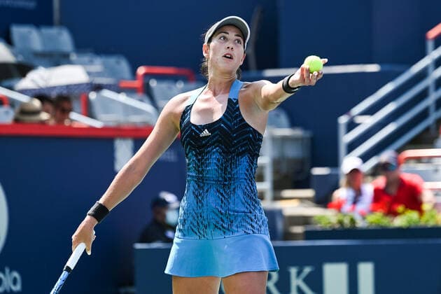 MONTREAL, QC - AUGUST 10: Grabine Muguruza (ESP) serves the ball during the second round WTA, Tennis Damen National Bank Open match on August 10, 2021 at IGA Stadium in Montreal, QC (Photo by David Kirouac Icon Sportswire) TENNIS: AUG 10 National Bank Open Icon210810055