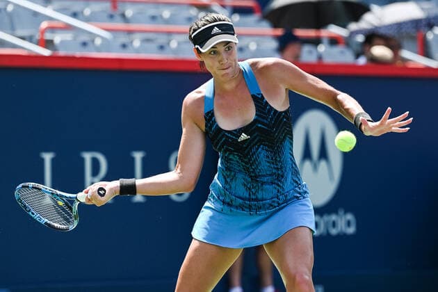 MONTREAL, QC - AUGUST 10: Grabine Muguruza (ESP) returns the ball during the second round WTA, Tennis Damen National Bank Open match on August 10, 2021 at IGA Stadium in Montreal, QC (Photo by David Kirouac Icon Sportswire) TENNIS: AUG 10 National Bank Open Icon210810056