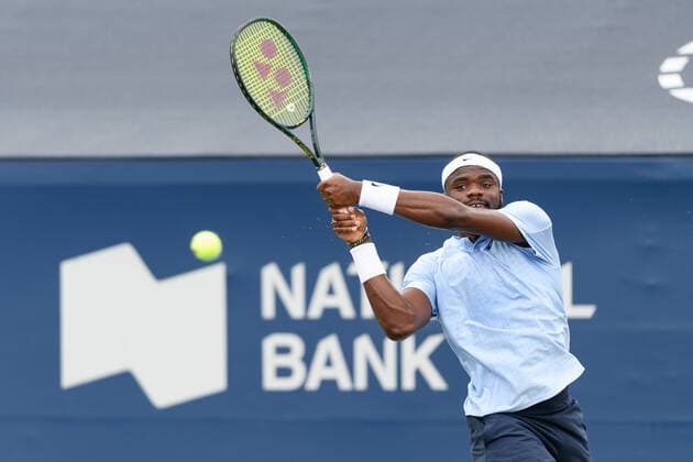 TORONTO, ON - AUGUST 10: Frances Tiafoe (USA) returns the ball during his National Bank Open tennis tournament first round game on August 10, 2021, at Aviva Centre in Toronto, ON, Canada. (Photo by Julian Avram Icon Sportswire) TENNIS: AUG 10 National Bank Open Icon2108100694