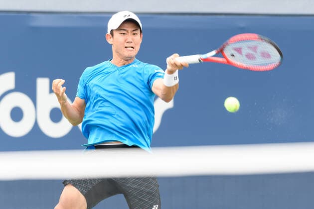 TORONTO, ON - AUGUST 10: Yoshihito Nishioka (JPN) returns the ball during his National Bank Open tennis tournament first round game on August 10, 2021, at Aviva Centre in Toronto, ON, Canada. (Photo by Julian Avram Icon Sportswire) TENNIS: AUG 10 National Bank Open Icon2108100699