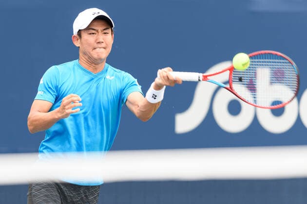 TORONTO, ON - AUGUST 10: Yoshihito Nishioka (JPN) returns the ball during his National Bank Open tennis tournament first round game on August 10, 2021, at Aviva Centre in Toronto, ON, Canada. (Photo by Julian Avram Icon Sportswire) TENNIS: AUG 10 National Bank Open Icon2108100711