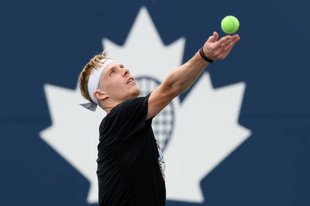 TORONTO, ON - AUGUST 10: Denis Shapovalov (CAN) serves the ball as he warms up during National Bank Open tennis tournament on August 10, 2021, at Aviva Centre in Toronto, ON, Canada. (Photo by Julian Avram Icon Sportswire) TENNIS: AUG 10 National Bank Open Icon2108100914