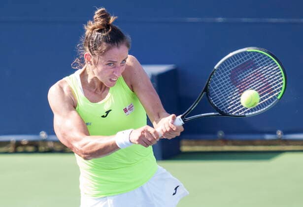 August 10, 2021, Montreal, PQ, Canada: Sara Sorribes Tormo of Spain returns to Canada s Carol Zhao during first round of play at the National Bank Open tennis tournament Tuesday August 10, 2021 in Montreal. Sara Sorribes Tormo  - ZUMAc35_ 20210810_zaf_c35_115 Copyright: xPaulxChiassonx