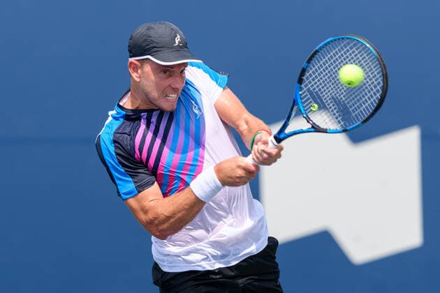 TORONTO, ON - AUGUST 11: James Duckworth (AUS) returns the ball during his National Bank Open tennis tournament second round game on August 11, 2021, at Aviva Centre in Toronto, ON, Canada. (Photo by Julian Avram Icon Sportswire) TENNIS: AUG 11 National Bank Open Icon2108110040