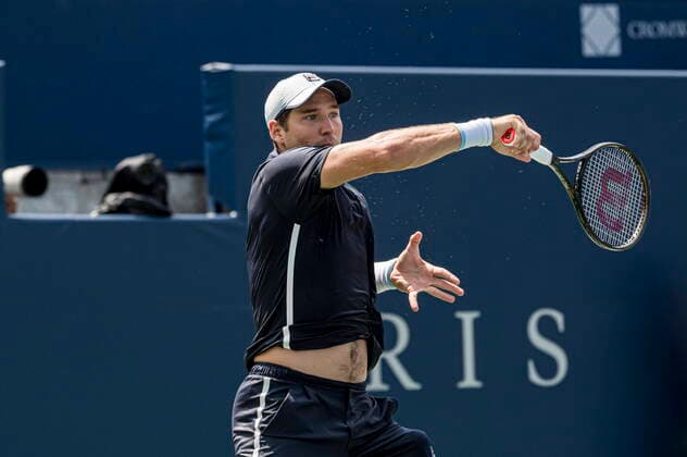 August 11, 2021, Toronto, on, Canada: Serbia s Dusan Lajovic returns the ball to Canada s Felix Auger-Aliassime during Men s National Bank Open tennis action, in Toronto on Wednesday, Aug., 11, 2021. Canada News - August 11, 2021  - ZUMAc35_ 20210811_zaf_c35_053 Copyright: xChristopherxKatsarovx