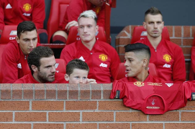 Mandatory Credit: Photo by Paul Greenwood BPI Shutterstock (5821536f) Kai Ronney takes his place on the substitutes bench with Juan Mata and Marcos Rojo during the Wayne Rooney testimonial match between Manchester United, ManU and Everton played at Old Trafford, Manchester on August 3rd 2016 Football - Club Friendlies 2016 Wayne Rooney Testimonial - Manchester United v Everton Old Trafford, Sir Matt Busby Way, Manchester, United Kingdom - 03 Aug 2016 EDITORIAL USE ONLY No use with unauthorised audio, video, data, fixture lists, club league logos or live services. Online in-match use limited to 75 images, no video emulation. No use in betting, games or single club league player publications. Football - Club Friendlies 2016 Wayne Rooney Testimonial - Manchester United v Everton Old Trafford, Sir Matt Busby Way, Manchester, United Kingdom - 03 Aug 2016 EDITORIAL USE ONLY No use with unauthorised audio, video, data, fixture lists, club league logos or live services. Online in-match use limited to 75 images, no video emulation. No use in betting, games or single club league player publications. Copyright: xPaulxGreenwood BPI Shutterstockx 5821536f