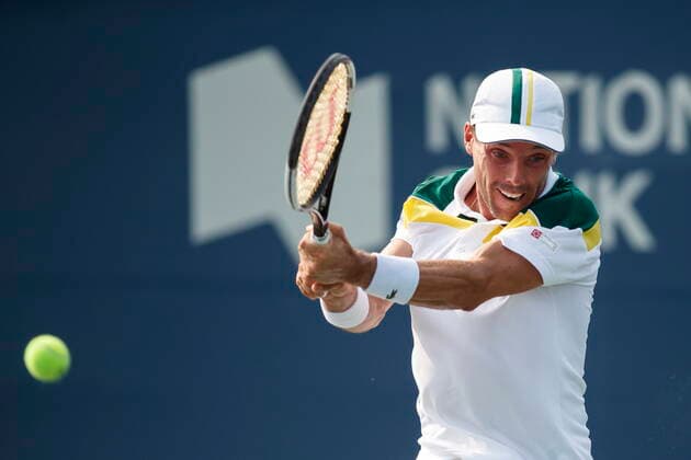 August 11, 2021, Toronto, on, Canada: Roberto Bautista Agut of Spain, returns a ball to Tommy Paul of the United States of America, during National Bank Open men s tennis action, in Toronto, Wednesday, Aug. 11, 2021. Canada News - August 11, 2021 - ZUMAc35_ 20210811_zaf_c35_221 Copyright: xColexBurstonx