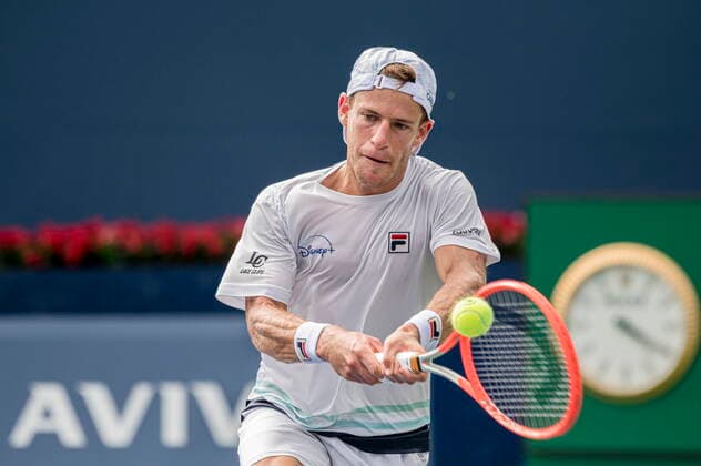 August 11, 2021, Toronto, on, Canada: ArgentinaÃ¢â‚¬â ¢s Diego Schwartzman returns the ball to FranceÃ¢â‚¬â ¢s Benoit Paire during MenÃ¢â‚¬â ¢s National Bank Open tennis action, in Toronto on Wednesday, Aug., 11, 2021. Canada News - August 11, 2021  - ZUMAc35_ 20210811_zaf_c35_241 Copyright: xChristopherxKatsarovx