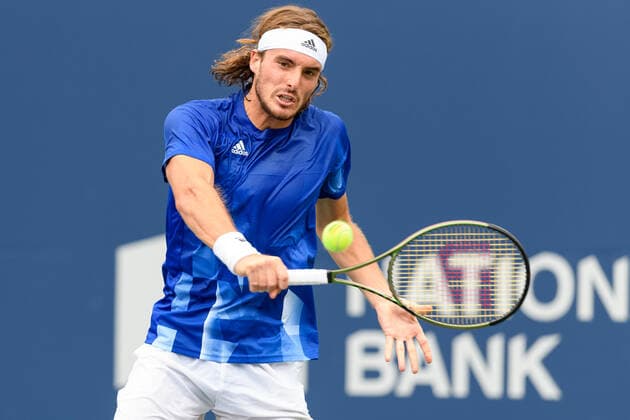 TORONTO, ON - AUGUST 12: Stefanos Tsitsipas (GRE) returns the ball during his National Bank Open tennis tournament third round game on August 12, 2021, at Aviva Centre in Toronto, ON, Canada. (Photo by Julian Avram Icon Sportswire) TENNIS: AUG 12 National Bank Open Icon2108120044