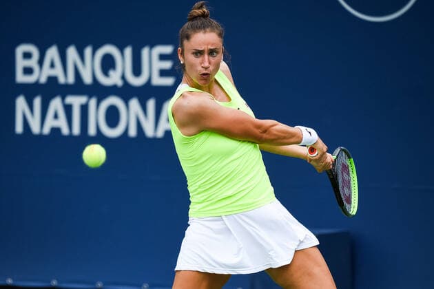 August 12, 2021: Sara Sorribes Tormo (ESP) returns the ball during the WTA, Tennis Damen National Bank Open third round match at IGA Stadium in Montreal, Quebec. CSM Montreal Canada - ZUMAc04_ 20210812_zaf_c04_012 Copyright: xDavidxKirouacx