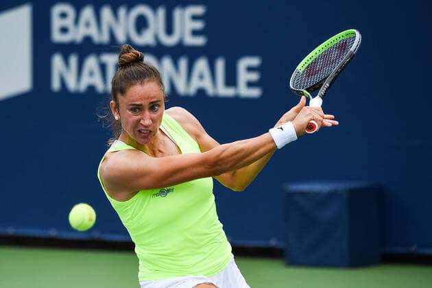 August 12, 2021: Sara Sorribes Tormo (ESP) returns the ball during the WTA, Tennis Damen National Bank Open third round match at IGA Stadium in Montreal, Quebec. CSM Montreal Canada - ZUMAc04_ 20210812_zaf_c04_015 Copyright: xDavidxKirouacx