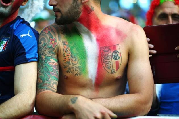 Mandatory Credit: Photo by Michael Zemanek BPI Shutterstock (5744421es) Fan of Italy shows off his tattoos during the UEFA EURO, EM, Europameisterschaft,Fussball 2016 Quarter-final match between Germany and Italy played at Stadium Bordeaux , Bordeaux , France on July 2nd 2016 Football - UEFA European Championships 2016 Quarter Finals Germany v Italy Nouveau Stade de Bordeaux, Bordeaux, France - 2 Jul 2016 EDITORIAL USE ONLY No use with unauthorised audio, video, data, fixture lists, club league logos or live services. Online in-match use limited to 75 images, no video emulation. No use in betting, games or single club league player publications. Football - UEFA European Championships 2016 Quarter Finals Germany v Italy Nouveau Stade de Bordeaux, Bordeaux, France - 2 Jul 2016 EDITORIAL USE ONLY No use with unauthorised audio, video, data, fixture lists, club league logos or live services. Online in-match use limited to 75 images, no video emulation. No use in betting, games or single club league player publications.  Copyright: xMichaelxZemanek BPI Shutterstockx 5744421es
