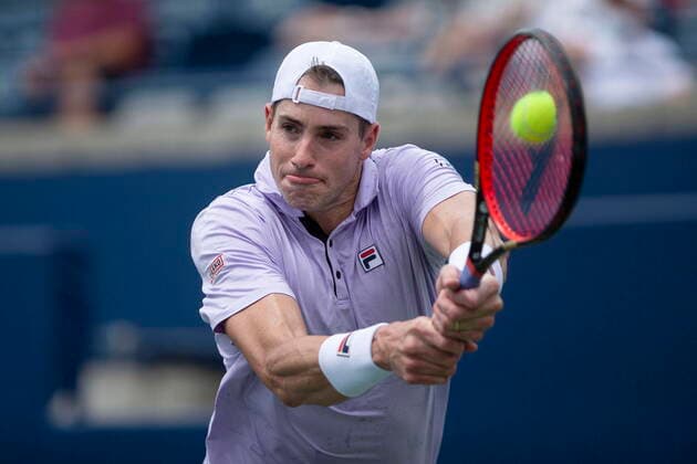 August 12, 2021, Toronto, on, Canada: John Isner of the USA plays a return during his win over Russia s Andrey Rublev in MenÃ¢â‚¬â ¢s National Bank Open tennis action in Toronto, Thursday, Aug. 12, 2021 John Isner  - ZUMAc35_ 20210812_zaf_c35_049 Copyright: xChrisxYoungx