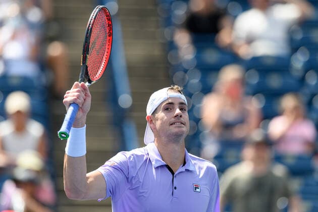 TORONTO, ON - AUGUST 12: John Isner (USA) celebrates after winning his National Bank Open tennis tournament third round game on August 12, 2021, at Aviva Centre in Toronto, ON, Canada. (Photo by Julian Avram Icon Sportswire) TENNIS: AUG 12 National Bank Open Icon2108120734