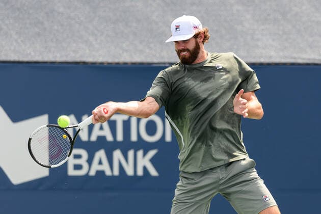 TORONTO, ON - AUGUST 12: Reilly Opelka (USA) returns the ball during his National Bank Open tennis tournament third round game on August 12, 2021, at Aviva Centre in Toronto, ON, Canada. (Photo by Julian Avram Icon Sportswire) TENNIS: AUG 12 National Bank Open Icon2108120750