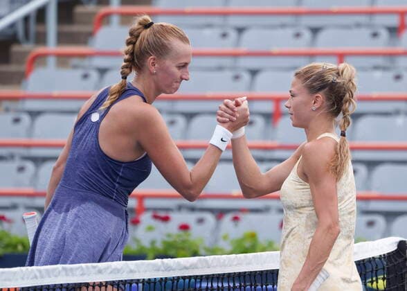 August 12, 2021, Montreal, PQ, Canada: Petra Kvitova, left, of the Czech Republic congratulates Camila Giorgi of Italy for her win during round of sixteen play at the National Bank Open tennis tournament Thursday August 12, 2021 in Montreal. Petra Kvitova Camila Giorgi  - ZUMAc35_ 20210812_zaf_c35_088 Copyright: xPaulxChiassonx