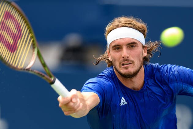 TORONTO, ON - AUGUST 13: Stefanos Tsitsipas (GRE) returns the ball during his National Bank Open tennis tournament quarterfinals game on August 13, 2021, at Aviva Centre in Toronto, ON, Canada. (Photo by Julian Avram Icon Sportswire) TENNIS: AUG 13 National Bank Open Icon2108122252