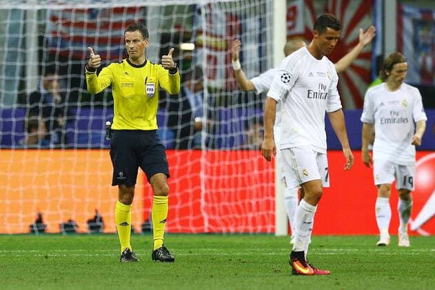 Mandatory Credit: Photo by Kieran Mcmanus BPI Shutterstock (5696816by) Referee Mr Mark Clattenburg gives a double thumbs up behind Cristiano Ronaldo of Real Madrid during the UEFA Champions League final between Real Madrid and Atletico Madrid played at the Giuseppe Meazza Stadium (San Siro), Milan, Italy on May 28th 2016 UEFA Champions League 2015 16 Final Real Madrid v Atletico Madrid San Siro, Giuseppe Meazza, Milan, Italy - 28 May 2016 EDITORIAL USE ONLY No use with unauthorised audio, video, data, fixture lists, club league logos or live services. Online in-match use limited to 75 images, no video emulation. No use in betting, games or single club league player publications. UEFA Champions League 2015 16 Final Real Madrid v Atletico Madrid San Siro, Giuseppe Meazza, Milan, Italy - 28 May 2016 EDITORIAL USE ONLY No use with unauthorised audio, video, data, fixture lists, club league logos or live services. Online in-match use limited to 75 images, no video emulation. No use in betting, games or single club league player publications. Copyright: xKieranxMcmanus BPI Shutterstockx 5696816by