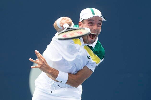 August 13, 2021, Toronto, on, Canada: Spain s Roberto Bautista Agut serves the ball to Reilly Opelka, of the United States, during National Bank Open men s tennis action in Toronto, Friday, Aug. 13, 2021. Roberto Bautista Agut.Reilly Opelka  - ZUMAc35_ 20210813_zaf_c35_078 Copyright: xChrisxYoungx