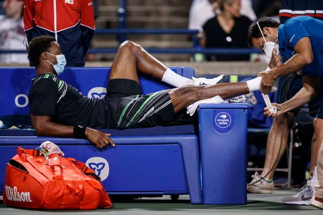 August 13, 2021, Toronto, on, Canada: Gael Monfils, of France, has his foot attended to during a medical time out during his quarter final match against John Isner, of United States, on Day 5 of the National Bank Open men s tennis, in Toronto, Friday, Aug. 13, 2021. Canada News - August 13, 2021 - ZUMAc35_ 20210813_zaf_c35_222 Copyright: xColexBurstonx