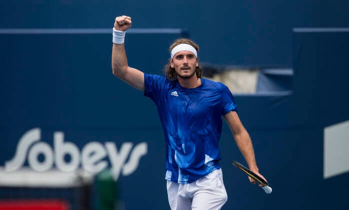 (210814) -- TORONTO, Aug. 14, 2021 -- Stefanos Tsitsipas of Greece celebrates victory after the quarterfinals of men s singles match against Casper Ruud of Norway at the 2021 National Bank Open in Toronto, Canada, on Aug. 13, 2021. (Photo by Xinhua) (SP)CANADA-TORONTO-TENNIS-NATIONAL BANK OPEN-MEN S SINGLES-QUARTERFINALS ZouxZheng 