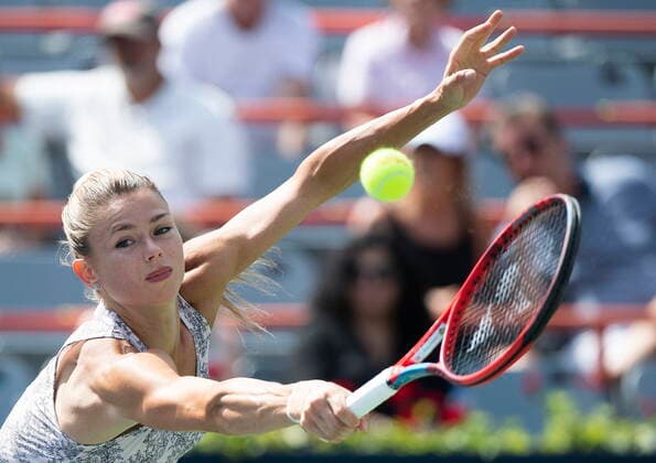 August 15, 2021, Montreal, PQ, Canada: Camila Giorgi, of Italy, reaches to return the ball to Karolina Pliskova, of the Czech Republic, during the final of the National Bank Open womenâ€⠢s tennis tournament in Montreal, Saturday, Aug. 14, 2021. Camila Giorgi, Karolina Pliskova , - ZUMAc35_ 20210815_zaf_c35_068 Copyright: xGrahamxHughesx