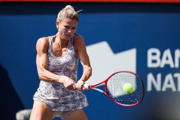 MONTREAL, QC - AUGUST 15: Camila Giorgi (ITA) returns the ball during the final WTA, Tennis Damen National Bank Open match on August 15, 2021 at IGA Stadium in Montreal, QC (Photo by David Kirouac Icon Sportswire) TENNIS: AUG 15 National Bank Open Icon210815032