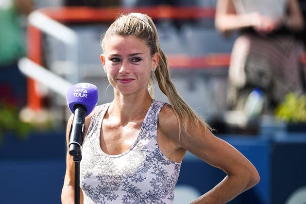 MONTREAL, QC - AUGUST 15: Camila Giorgi (ITA) addresses the crowd after winning the final WTA, Tennis Damen National Bank Open match on August 15, 2021 at IGA Stadium in Montreal, QC (Photo by David Kirouac Icon Sportswire) TENNIS: AUG 15 National Bank Open Icon210815038