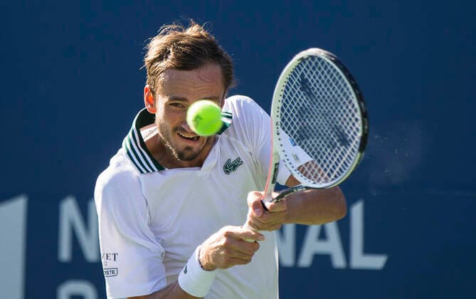 (210816) -- TORONTO, Aug. 16, 2021 -- Daniil Medvedev of Russia returns the ball during the men s singles final against Reilly Opelka of the United States at the 2021 National Bank Open in Toronto, Canada, on Aug. 15, 2021. (Photo by Xinhua) (SP)CANADA-TORONTO-TENNIS-NATIONAL BANK OPEN-MEN S SINGLES-FINAL ZouxZheng 