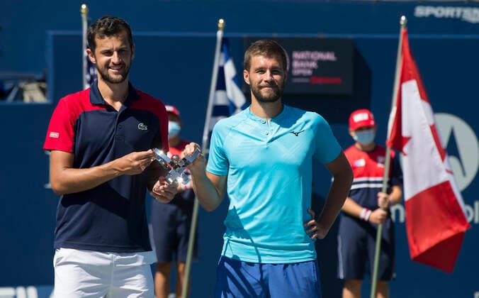 (210816) -- TORONTO, Aug. 16, 2021 -- Mate Pavic (L) and Nikola Mektic of Croatia pose for photos during the awarding ceremony after the men s doubles final against Rajeev Ram of the United States and Joe Salisbury of Britain at the 2021 National Bank Open in Toronto, Canada, on Aug. 15, 2021. (Photo by Xinhua) (SP)CANADA-TORONTO-TENNIS-NATIONAL BANK OPEN-MEN S DOUBLES-FINAL ZouxZheng 