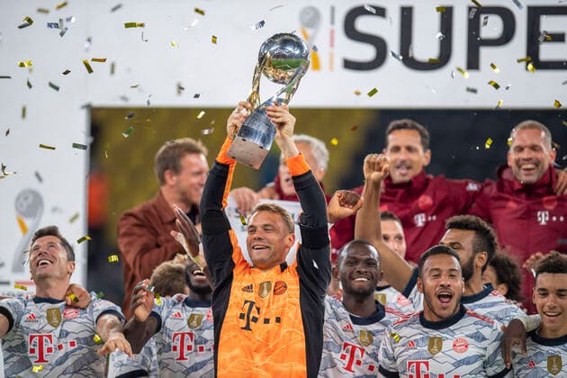 Football Super Cup, 2021 2022 season, Borussia Dortmund FC Bayern Munich on 17 08 2021 at Signal Iduna Park in Dortmund YY Munich goalkeeper Manuel Neuer lifts the trophy DFL and DFB REGULATES PROHIBIT ANY USE OF PHOTOGRAPHS AS IMAGE SEQUENCES AND OR QUASI VIDEO Copyright: xChristopherxNeundorfx