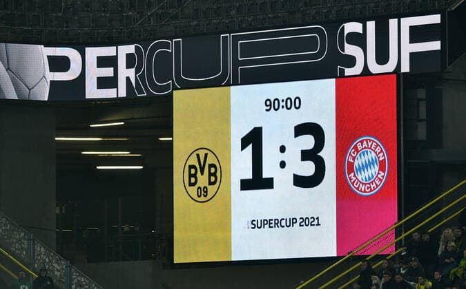 Football, Bundesliga, Germany, Men, Season 2021 2022, Supercup, Signal Iduna Park Dortmund Bor Dortmund, BVB yellow FC Bayern Munich, FCB white 1 3 final score on scoreboard DFB DFL REGULATES PROHIBIT ANY USE OF PHOTOGRAPHS AS IMAGE SEQUENCES AND OR QUASI VIDEO