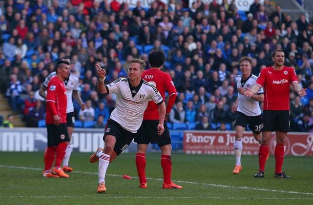 Mandatory Credit: Photo by Kieran Mcmanus BPI Shutterstock (3629072ac) Lewis Holtby of Fulham celebrates scoring his goal to make the score 1-1 Barclays Premier League 2013 14, Cardiff City v Fulham, Cardiff City Stadium, Cardiff, Wales, Britain - 08 Mar 2014 EDITORIAL USE ONLY No use with unauthorised audio, video, data, fixture lists (outside the EU), club league logos or live services. Online in-match use limited to 45 images (+15 in extra time). No use to emulate moving images. No use in betting, games or single club league player publications services. Barclays Premier League 2013 14, Cardiff City v Fulham, Cardiff City Stadium, Cardiff, Wales, Britain - 08 Mar 2014 EDITORIAL USE ONLY No use with unauthorised audio, video, data, fixture lists (outside the EU), club league logos or live services. Online in-match use limited to 45 images (+15 in extra time). No use to emulate moving images. No use in betting, games or  Copyright: xKieranxMcmanus BPI Shutterstockx 3629072ac