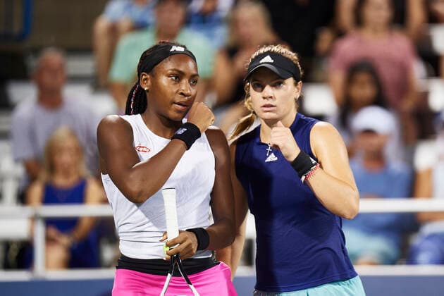 CINCINNATI, OH - AUGUST 18: Coco Gauff and doubles partner Catherine McNally of USA talk to each other between points during a match on day 3 of the Western and Southern Open at the Lindner Family Tennis Center in Mason, Ohio on August 18, 2021. (Photo by Shelley Lipton Icon Sportswire) TENNIS: AUG 18 Western & Southern Open Icon210818643