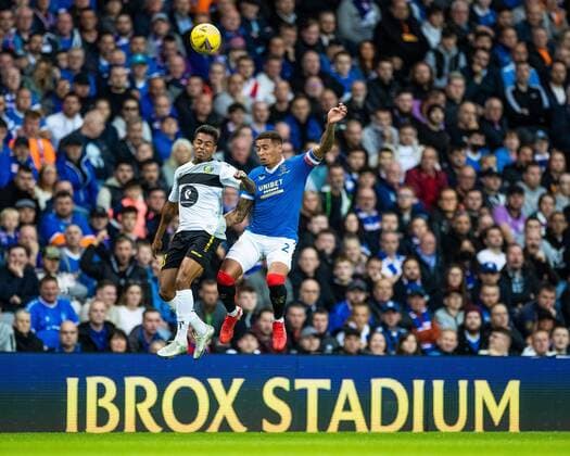 Mandatory Credit: Photo by Kirk O Rourke Rangers FC Shutterstock (12337251y) Rangers captain James Tavernier jumps with James of FC Alashkert during the Europa League qualifying match at Ibrox Stadium, Glasgow. Rangers v Alashkert, UEFA Europa League Qualifying Play-off, Ibrox Staiudm, Glasgow, Scotland, UK - 19 Aug 2021 Rangers v Alashkert, UEFA Europa League Qualifying Play-off, Ibrox Staiudm, Glasgow, Scotland, UK - 19 Aug 2021 Copyright: xKirkxO Rourke RangersxFC Shutterstockx 12337251y