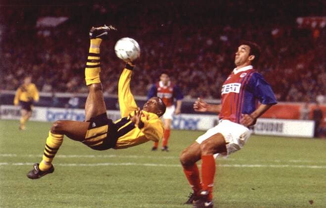 Mandatory Credit: Photo by Ted Blackbrow ANL Shutterstock (1329154a) Football European Cup Winners Cup Semi-final 1993-1994. Paris St. Germain V Arsenal 1-1. Ian Wright Tries For A Goal. Football European Cup Winners Cup Semi-final 1993-1994. Paris St. Germain V Arsenal 1-1. Ian Wright Tries For A Goal. EDITORIAL USE ONLY No use with unauthorised audio, video, data, fixture lists (outside the EU), club league logos or live services. Online in-match use limited to 45 images (+15 in extra time). No use to emulate moving images. No use in betting, games or single club league player publications services. Football European Cup Winners Cup Semi-final 1993-1994. Paris St. Germain V Arsenal 1-1. Ian Wright Tries For A Goal. EDITORIAL USE ONLY No use with unauthorised audio, video, data, fixture lists (outside the EU), club league logos or live services. Online in-match use limited to 45 images (+15 in extra time). No use to emulate moving images. No use in betting, games or  Copyright: xTedxBlackbrow ANL Shutterstockx 1329154a