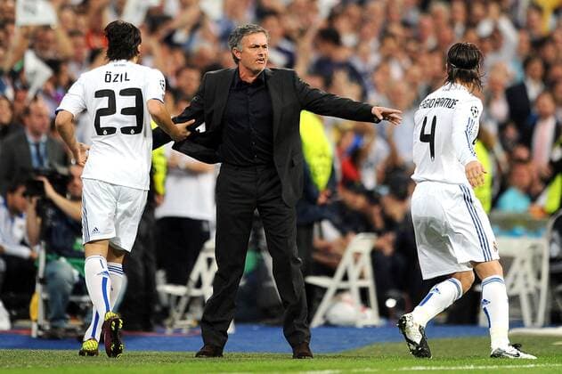 Mandatory Credit: Photo by Back Page Images Shutterstock (1303251v) Real Madrid manager Jose Mourinho celebrates the opening goal with Mesut Ozil and Sergio Ramos Real Madrid v Tottenham Hotspur, Champions League Quarter Final 1st Leg football match, Santiago Bernabeu stadium, Madrid, Spain - 05 Apr 2011 Real Madrid beat Tottenham Hotspur 4-0 EDITORIAL USE ONLY Real Madrid v Tottenham Hotspur, Champions League Quarter Final 1st Leg football match, Santiago Bernabeu stadium, Madrid, Spain - 05 Apr 2011 EDITORIAL USE ONLY  Copyright: xBackxPagexImages Shutterstockx 1303251v