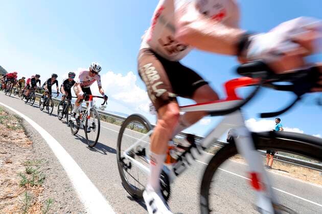 Riders in action during the 7th stage of the Spanish Cycling Vuelta in Alcoy, Valencia region, a 152km-long race between Gandia and Balcon de Alicante, Spain, 20 August 2021. 7th stage of the Spanish Cycling Vuelta !ACHTUNG: NUR REDAKTIONELLE NUTZUNG!  Copyright: xManuelxBruquex GRAF5347 20210820-f0bae320d4cf58df2ca838f37c333e6c2cc86c5c